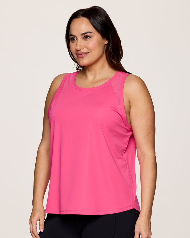 Front of a model wearing a size 3X Plus On The Run Tank in Pink by RBX Active. | dia_product_style_image_id:348442